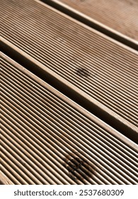 Pine spruce decking boards feature a smooth, natural finish with warm, light hues, a fine grain pattern. Durable, resistant to moisture, ideal for outdoor spaces, providing a sturdy attractive surface