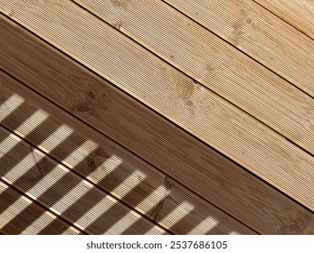 Pine spruce decking boards feature a smooth, natural finish with warm, light hues, a fine grain pattern. Durable, resistant to moisture, ideal for outdoor spaces, providing a sturdy attractive surface