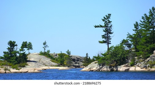      Pine Trees on Rugged Rocky Island in Georgian Bay Ontario                           - Shutterstock ID 2188696275