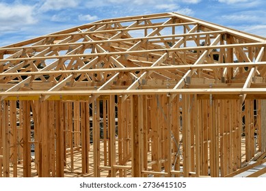 Pine wood stud wall frames on a house under construction in Australia; a symbol of the housing property crisis.