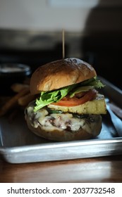 Pineapple Cheese Burger With Fries Cole Slaw And A Pickle