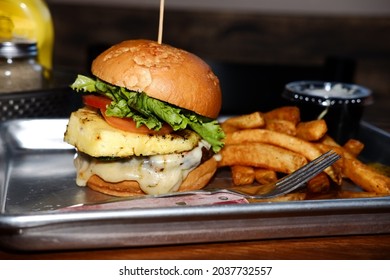 Pineapple Cheese Burger With Fries Cole Slaw And A Pickle