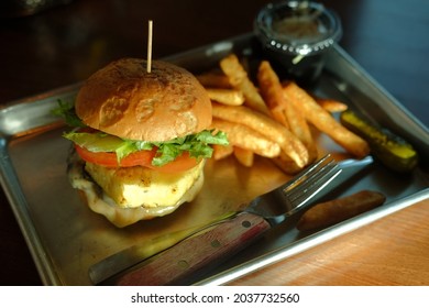 Pineapple Cheese Burger With Fries Cole Slaw And A Pickle