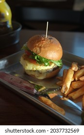 Pineapple Cheese Burger With Fries Cole Slaw And A Pickle