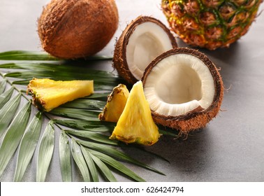 Pineapple And Coconut On Gray Background