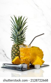 Pineapple Cooler Drink With Yellow Pineapple Juice, Ice Cubes, Hawthorne Strainer. Fresh Tropical Fruit. Copy Space For Design. Summer Cooling Beverage Cooking Cocktail, Punch, Alcohol