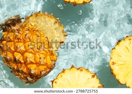 Pineapple floating in clean, moving water.