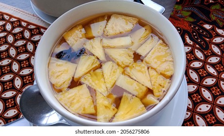 Pineapple Fruit Compote Served In A White Ceramic Bowls. 