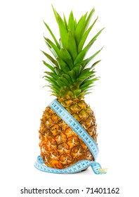 Pineapple with a measuring tape around