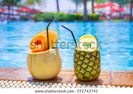 Pineapple and melon cocktails at the swimming pool