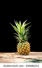 Pineapple on black background