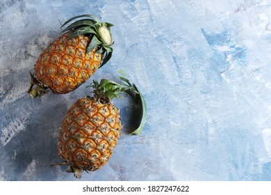 Pineapple on Blue Rustic Background, Copy Space