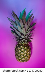 Pineapple on purple background. Creative concept.