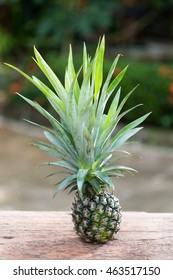 Pineapple on wooden table