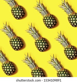 Pineapple pattern on yellow background, exotic, tropical concept