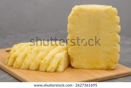 Pineapple peeled and cut in half
