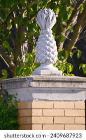 Pineapple Statue on a Brick Base