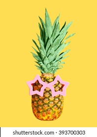 Pineapple with sunglasses on yellow background, colorful ananas