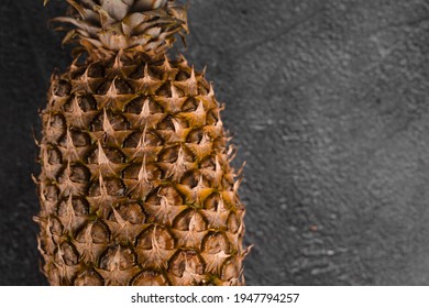 Pineapple Tropical Fruit On Dark Stone Background Background. Citrus Fruit With Vitamin C For Helth Care