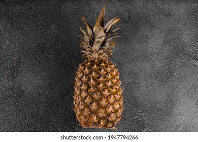 Pineapple Tropical Fruit On Dark Stone Background Background. Citrus Fruit With Vitamin C For Helth Care