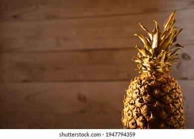 Pineapple Tropical Fruit On Wooden Background. Citrus Fruit With Vitamin C For Helth Care