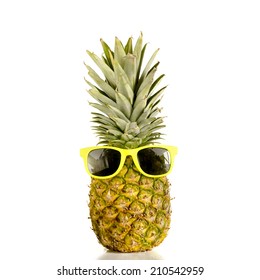 Pineapple wearing sunglasses - Summertime vacation holiday eating healthy concept image