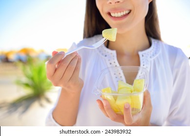 Pineapple - Woman Eating Sliced Hawaiian Pineapple Fruit As A Healthy Snack From Take Away Bowl.