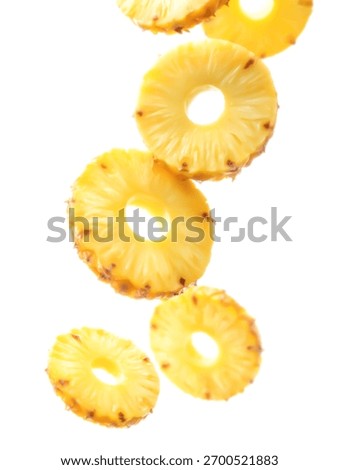 Pineapples ring floating in air, isolated on white background.