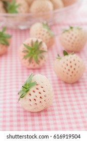 Pineberries A Hybrid Albino Strawberry With A Pineapple Flavor White Flesh And Red Seeds Focus On The Front Berry