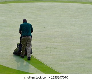 Pinehurst, NC, United States- 07/04/2017- A Worker At The Pinehurst Country Club Mows The Green Early One Morning On The 14th Hole Of Pinehurst No. 4. 