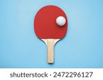 Ping pong racket with the ball for playing table tennis on a colored background