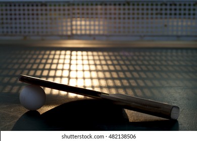 Ping pong table and net closeup in sunset light. Shadow - Powered by Shutterstock