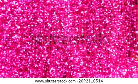 Pink abstract background with bokeh defocused lights christmas