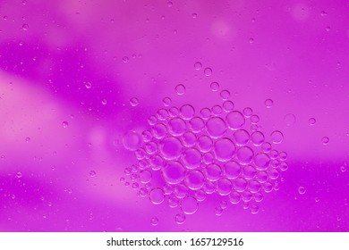 Pink abstract background with group of bubbles close up - banner background