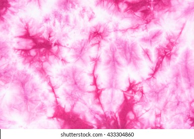 Pink Abstract tie dyed fabric batik background and texture