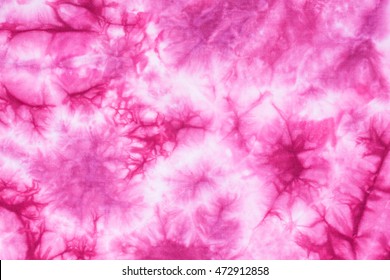 Pink Abstract tie dyed fabric batik background and texture
