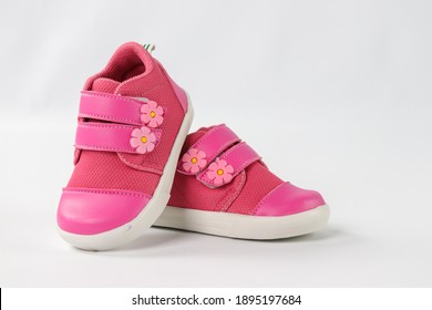Pink Baby Girl Shoes On White Background