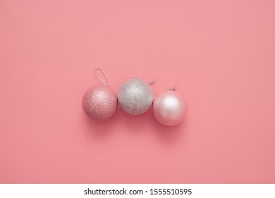 Pink Background With Pink Balls. Christmas Flay Lay. Top View