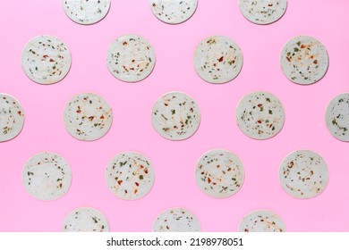 Pink Background Pattern With Circles Of Vegetarian Sausage