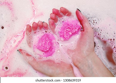 Pink Bath Bomb In Hands