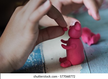 Pink Bear Play Doh Sculpture  On Wooden Table 