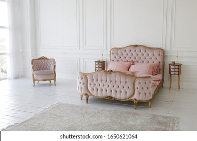 Pink Bed And Chair In The Art Deco Style In The White Bedroom Interior