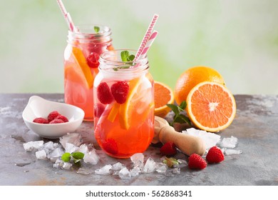 Pink Berry And Orange Lemonade Or Cocktail In Mason Jar