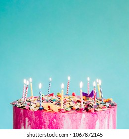 Pink Birthday Cake Over Blue Background