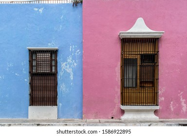 Pink and blue, colorful colonial building facades in Campeche, Yucatan, Mexico.