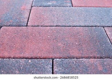 pink and blue rectangular block paving slabs.