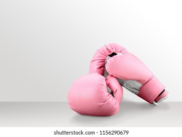 Pink Boxing Gloves On Desk