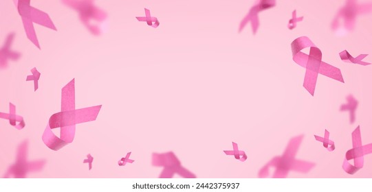 Pink Breast Cancer Awareness Ribbon. Flying pink ribbons on pink background. Breast cancer awareness and October Pink day, world cancer day. Top view. Mock up.  - Powered by Shutterstock