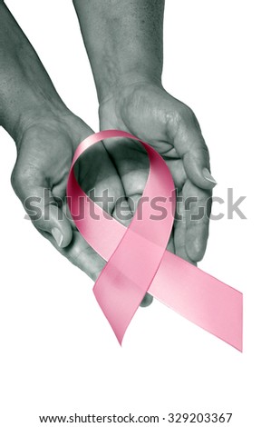 Pink Breast Cancer Awareness Ribbon In Gentle Female Hands/ Pink Breast Cancer Awareness Ribbon In Hands