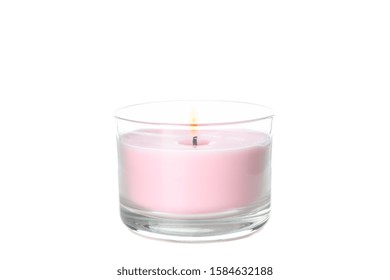 Pink Burning Candle In Glass Jar Isolated On White Background